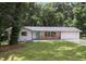 Charming single story home with a front yard and a garage at 3918 Artist Vw, Decatur, GA 30034