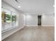 Bright living room featuring wood floors and ample natural light through large windows at 3918 Artist Vw, Decatur, GA 30034