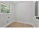 Small room with wood floors, a window, and access to electrical panel at 3918 Artist Vw, Decatur, GA 30034