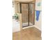 Bathroom featuring a tiled shower with glass door and soaking tub at 504 Liverpool Dr, Mcdonough, GA 30252