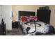 Bedroom with decorative bedding, dark wood furniture, and neutral wall color at 504 Liverpool Dr, Mcdonough, GA 30252