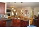 Open kitchen with granite countertops, stainless steel appliances, and seating at 504 Liverpool Dr, Mcdonough, GA 30252