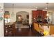 Spacious kitchen with island seating opening to dining area and living space, ideal for entertaining at 504 Liverpool Dr, Mcdonough, GA 30252