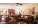 Cozy living room with a comfortable sectional sofa, connecting seamlessly to the kitchen and dining area at 504 Liverpool Dr, Mcdonough, GA 30252