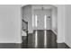 The entryway is very bright due to the sidelights and features hardwood flooring at 2377 Proctor Creek Enclave, Acworth, GA 30101