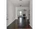 Bright foyer with hardwood floors leads to an open living space with a fireplace at 2377 Proctor Creek Enclave, Acworth, GA 30101