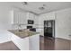 Well-lit kitchen boasts granite countertops and stainless steel appliances at 2377 Proctor Creek Enclave, Acworth, GA 30101