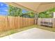 Cozy patio space with a privacy fence and shade, perfect for outdoor relaxation and entertaining at 2377 Proctor Creek Enclave, Acworth, GA 30101