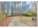 View of the backyard and fence, with a concrete slab for a patio at 430 Argus Nw Cir, Atlanta, GA 30331