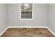 Bedroom highlighting contemporary vinyl floors and a bright window at 430 Argus Nw Cir, Atlanta, GA 30331