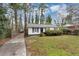 Charming single-story home with well-kept lawn, mature trees and traditional curb appeal at 430 Argus Nw Cir, Atlanta, GA 30331