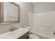 Clean bathroom features a tub/shower combo, vanity sink, and a framed mirror at 229 Millwheel Dr, Villa Rica, GA 30180