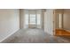 Bedroom features plush carpet, neutral paint, bay window, and plenty of natural light at 229 Millwheel Dr, Villa Rica, GA 30180