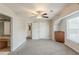 Bedroom with ensuite bathroom, carpet, built-in storage and a window at 229 Millwheel Dr, Villa Rica, GA 30180