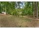 Spacious backyard with a wooden fence at 601 Ashley Forest Nw Dr, Acworth, GA 30102