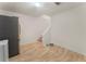 Basement featuring linoleum floors, white walls, and finished stairs at 601 Ashley Forest Nw Dr, Acworth, GA 30102