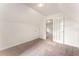 Cozy bedroom with white walls and a view into another room at 601 Ashley Forest Nw Dr, Acworth, GA 30102