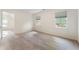 Bright bedroom with neutral walls and carpet, large windows, and natural light at 601 Ashley Forest Nw Dr, Acworth, GA 30102