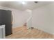 Kitchen dining area with wooden floors, white walls, and appliances at 601 Ashley Forest Nw Dr, Acworth, GA 30102