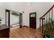 Warm and inviting foyer featuring hardwood floors and decorative glass door at 601 Ashley Forest Nw Dr, Acworth, GA 30102