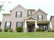 Charming two-story home with a well-manicured lawn and inviting entrance at 1143 Park Hollow Ne Ln, Lawrenceville, GA 30043