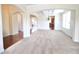 Bright living room features coffered ceilings and arched doorways at 1143 Park Hollow Ne Ln, Lawrenceville, GA 30043