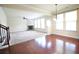 Spacious living area with stone fireplace and hardwood floors at 1143 Park Hollow Ne Ln, Lawrenceville, GA 30043