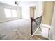Second story view of living room, staircase and open floorplan at 1143 Park Hollow Ne Ln, Lawrenceville, GA 30043