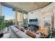 Bright living room with large windows offering city views and comfortable seating area at 3324 Peachtree Ne Rd # 1104, Atlanta, GA 30326