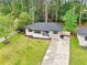 Aerial shot of a well-maintained home with a lush lawn and mature trees at 117 Hillsdale Dr, Atlanta, GA 30315