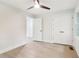 Bedroom featuring a ceiling fan, double closet, and hardwood floors at 117 Hillsdale Dr, Atlanta, GA 30315