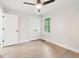 Bedroom with ceiling fan, double closet, and an exterior view at 117 Hillsdale Dr, Atlanta, GA 30315