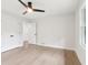 Bedroom with double closet, light hardwood flooring, and natural light at 117 Hillsdale Dr, Atlanta, GA 30315