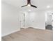 Bedroom with wood floors featuring ceiling fan and multiple interior door and closet access at 117 Hillsdale Dr, Atlanta, GA 30315