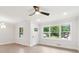 Open-concept living room with new flooring, fresh paint, and abundant natural light at 117 Hillsdale Dr, Atlanta, GA 30315