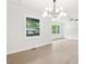 Well-lit living space showcasing new flooring and windows, offering a comfortable atmosphere at 117 Hillsdale Dr, Atlanta, GA 30315