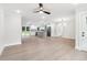 Bright open-concept living space showcasing the modern kitchen and dining area at 117 Hillsdale Dr, Atlanta, GA 30315