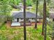 View of the home's rear featuring a deck and patio that are excellent for outdoor living and entertaining at 117 Hillsdale Dr, Atlanta, GA 30315