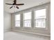 Bright bedroom featuring carpet, neutral paint, and large windows at 247 Franklin Rd, Atlanta, GA 30342