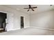 Spacious bedroom with neutral carpet and an en-suite bathroom at 247 Franklin Rd, Atlanta, GA 30342