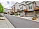 Row of modern townhomes with private garages and charming balcony spaces at 247 Franklin Rd, Atlanta, GA 30342