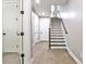 Hallway featuring hardwood floors and staircase leading to the upper level at 247 Franklin Rd, Atlanta, GA 30342