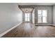 Bright living area with hardwood flooring and a modern wood ceiling, showcasing natural light at 247 Franklin Rd, Atlanta, GA 30342
