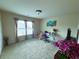 Bedroom with carpeted floor, window with curtains, desk, and a ceiling light at 545 Eldridge Dr, Suwanee, GA 30024