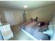 Bedroom boasts carpet, soft lighting, neutral walls, and a dresser, creating a calm and inviting atmosphere at 545 Eldridge Dr, Suwanee, GA 30024