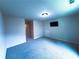 Bright and spacious bonus room with a television and adjacent room view at 545 Eldridge Dr, Suwanee, GA 30024