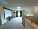 Spacious carpeted bonus room with projector screen and comfortable seating area at 545 Eldridge Dr, Suwanee, GA 30024