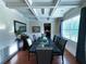 Bright dining room with coffered ceilings, hardwood floors, and a modern table setting perfect for entertaining at 545 Eldridge Dr, Suwanee, GA 30024