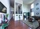 Grand foyer showcasing hardwood floors, soaring ceilings, elegant decor, and a view of the staircase at 545 Eldridge Dr, Suwanee, GA 30024