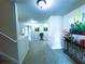 Upstairs hallway with neutral paint, carpeted flooring, and artwork at 545 Eldridge Dr, Suwanee, GA 30024